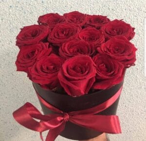 Midnight Bloom – 13 Red Roses in Stylish Black Gift Bucket